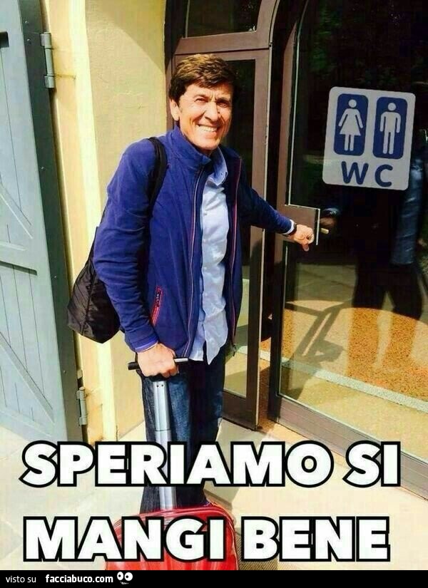 Gianni Morandi entra in un bagno. Sepriamo si mangi bene