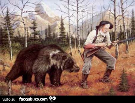 Il cacciatore con l'orso alle spalle